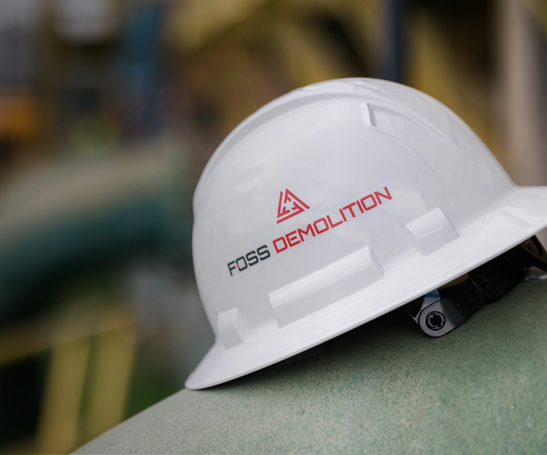 Foss Demolition logo on Hardhat